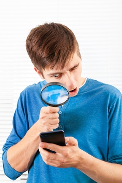 Magnifying Glass and Phone