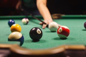 Pool cues and balls