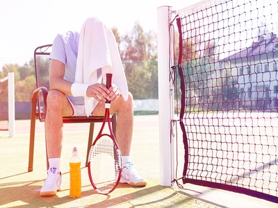 Tennis Player Towel Over Head