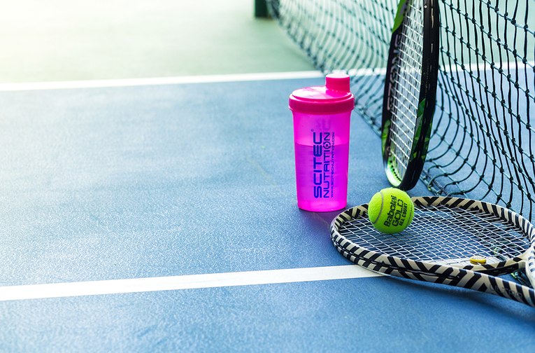 Tennis Rackets and Water Bottle