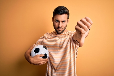 Unhappy Football Fan Thumbs Down